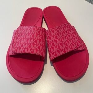 Pink Michael Kors woman’s slides